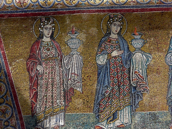 Two Women Holding Lamps